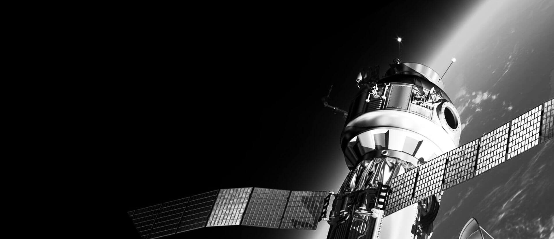 black and white image of a satellite in space